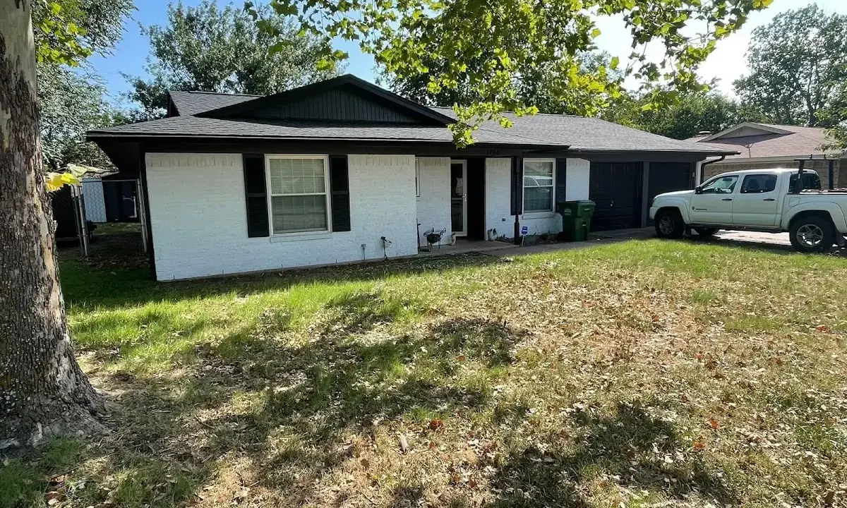 Professional roofing crew working on a residential roof in Palm Beach Gardens